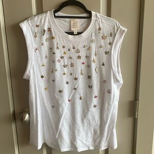 White top with charms